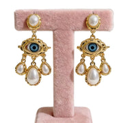 Orecchini lunghi retr¨° con occhi azzurri esagerati, orecchini a goccia di perle alla moda, aghi in argento S925