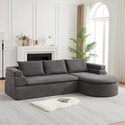 Divano angolare con chaise longue in chenille con bracciolo a gradini e schienali imbottiti grigio antracite