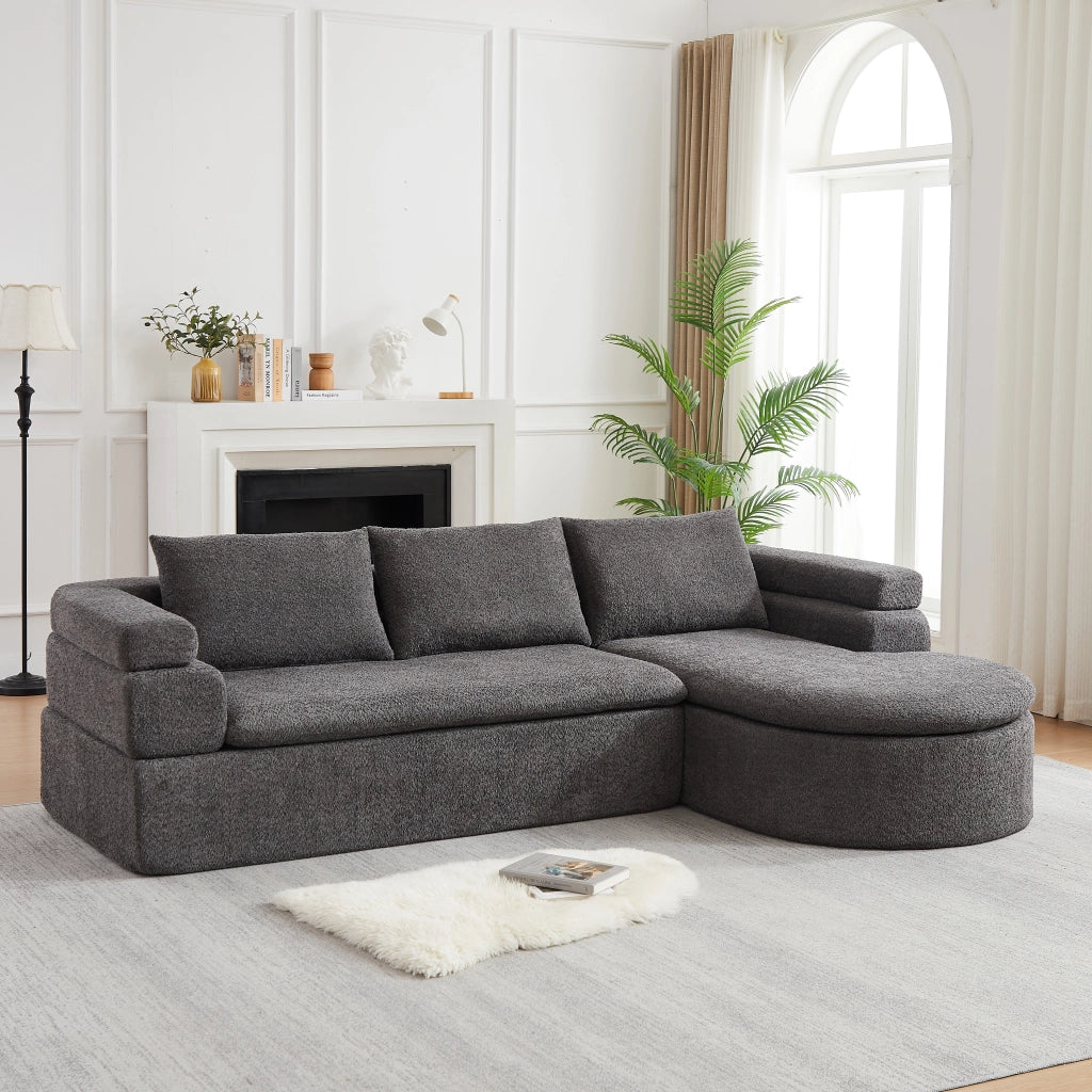 Divano angolare con chaise longue in chenille con bracciolo a gradini e schienali imbottiti grigio antracite