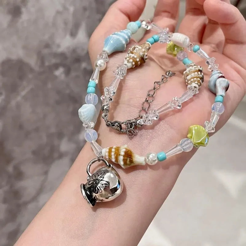 Collana fatta a mano con conchiglie e perline: ciondolo a forma di clavicola in stile spiaggia