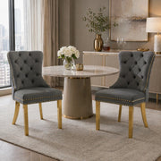 Sedia da pranzo imbottita in velluto grigio con anello decorativo; gambe in acciaio inox dorato; 50;5 x 45 x 95 cm