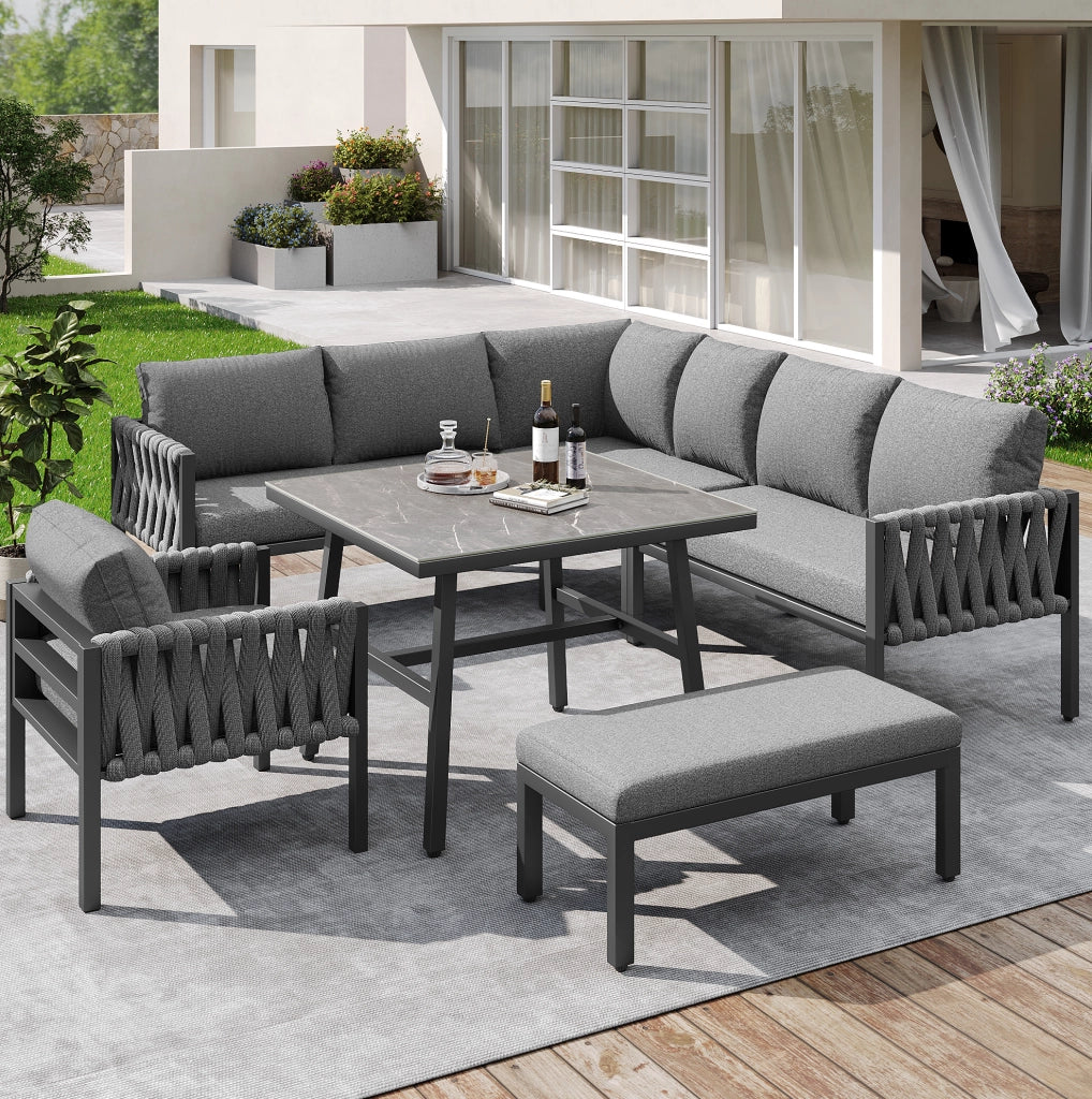 Set da giardino in metallo e poliestere con divano angolare; tavolo in vetro temperato; grigio