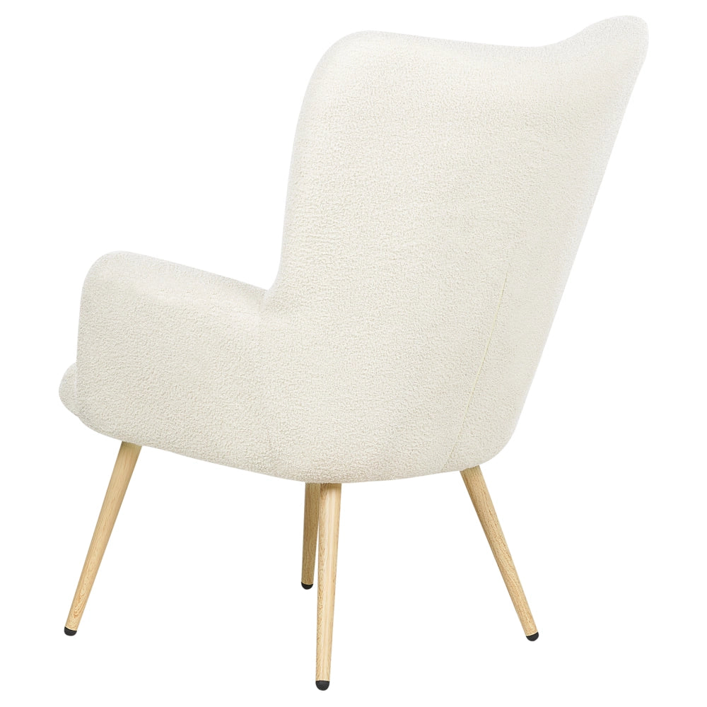 Poltrona rivestita in tessuto beige con motivo floreale con poggiapiedi in stile retrò