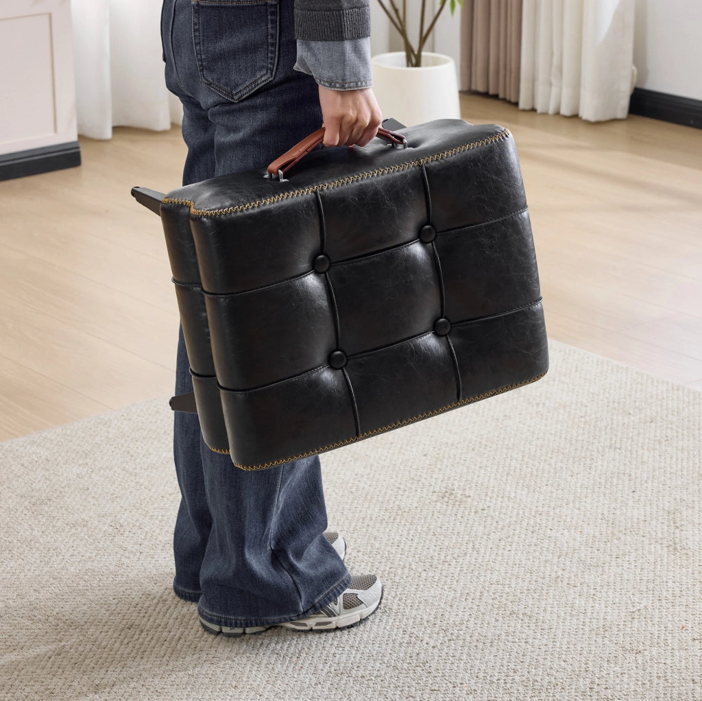 Pouf poggiapiedi portatile in PU nero con maniglia marrone e gambe in acciaio