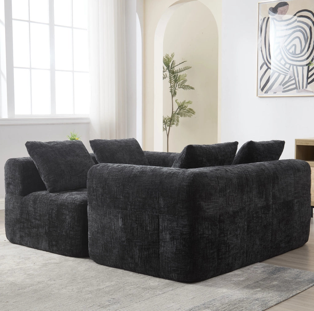 Divano angolare modulare 3 posti in ciniglia nera con chaise longue, tasche laterali e cuscini