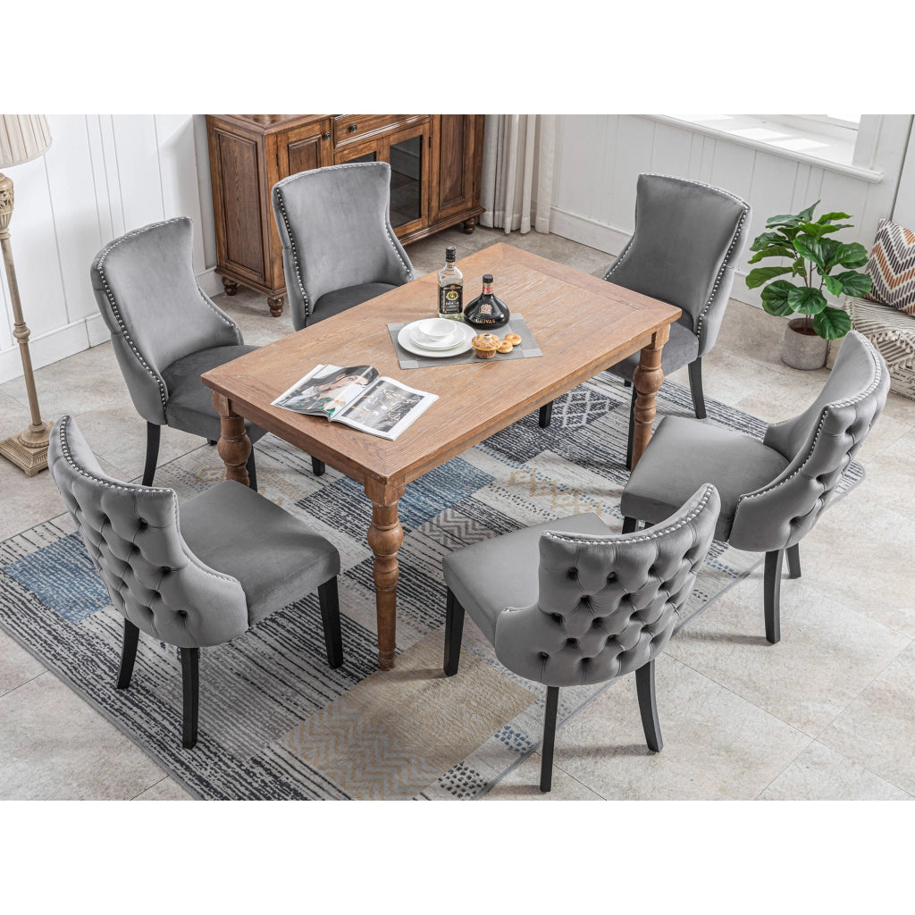 Sedia da pranzo con trapuntatura e anello cromato in velluto grigio gambe in legno massiccio