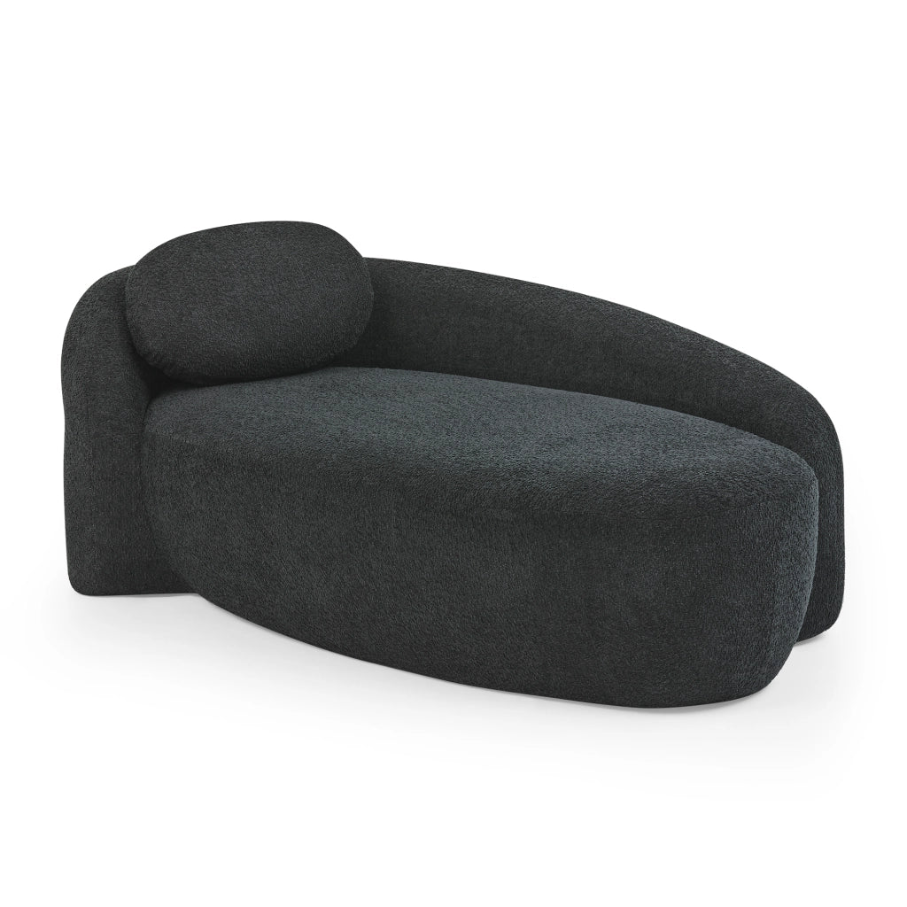 Divano minimalista in tessuto Teddy nero, imbottitura morbida e design salvaspazio