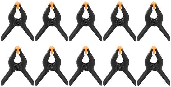 Clip di fissaggio schermo per telefoni cellulari e tablet, con presa antiscivolo e clip regolabile, realizzato in plastica leggera e resistente.