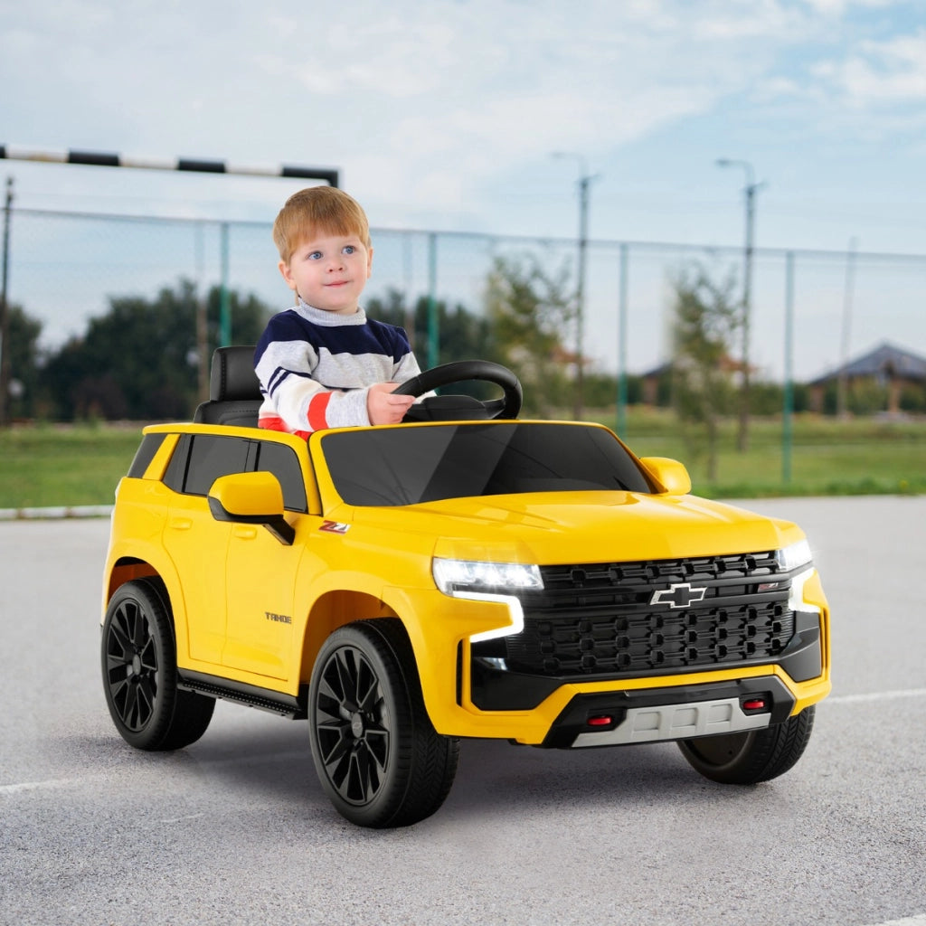 SUV elettrica 12V per bambini con telecomando 2,4G sospensione a molla luci e musica, Chevrolet auto elettrica Giallo-Macchinine giocattoli