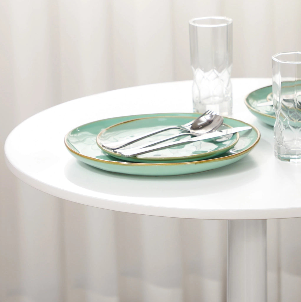 Tavolo da pranzo rotondo bianco Ø70 cm con base in acciaio