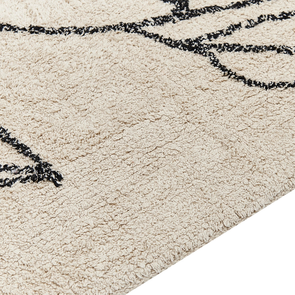 Tappeto cotone trapuntato motivo a foglie e nappe 80 x 150 cm beige e nero soggiorno camera da letto