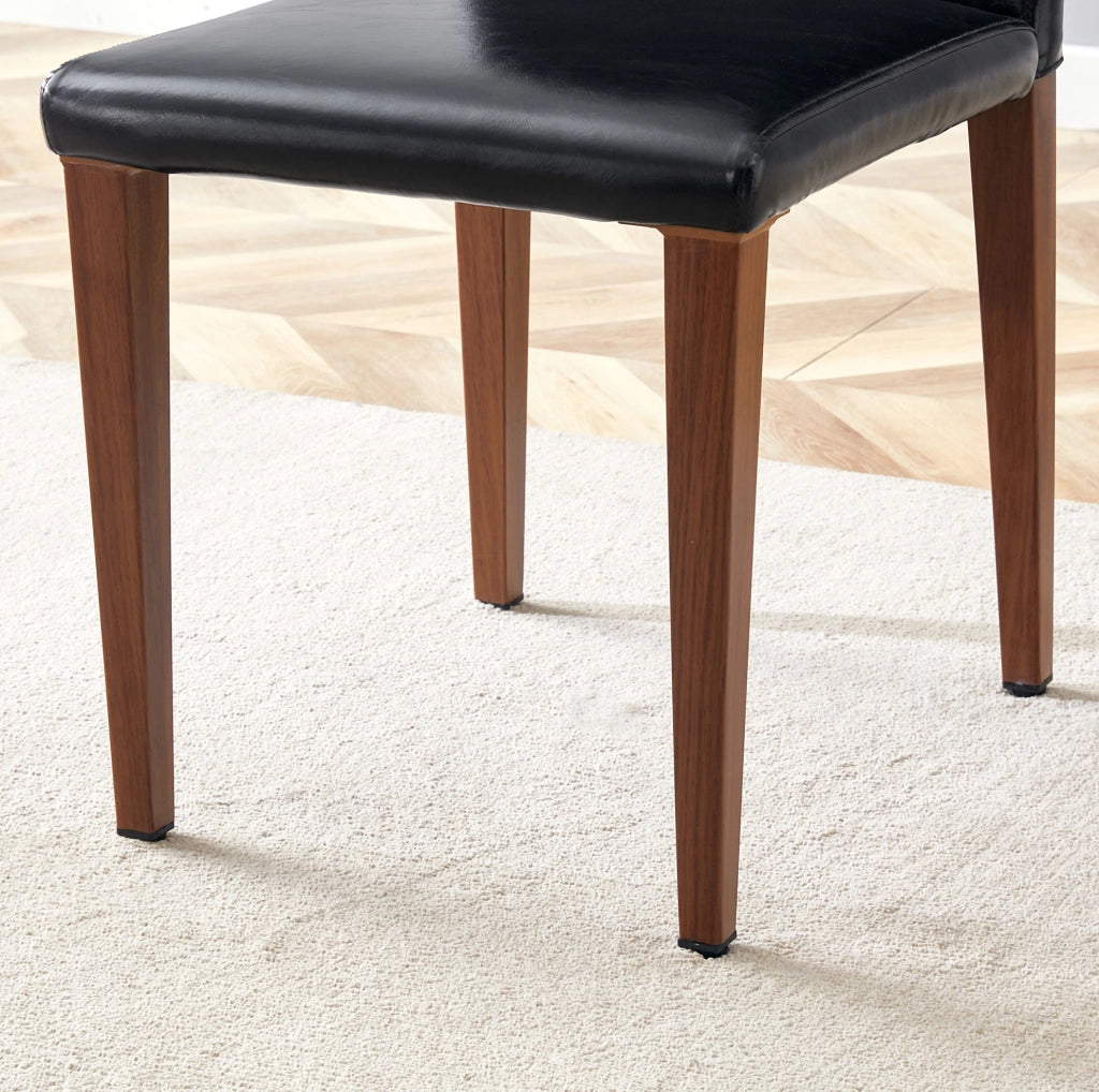 Set di 4 sedie da pranzo in PU nero e metallo effetto noce