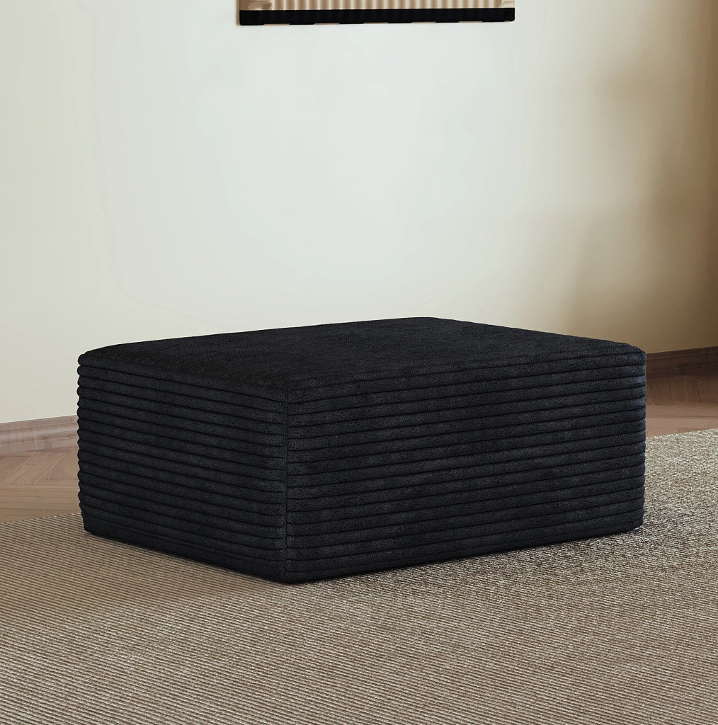 Pouf modulare in tessuto nero effetto vellutato; senza montaggio