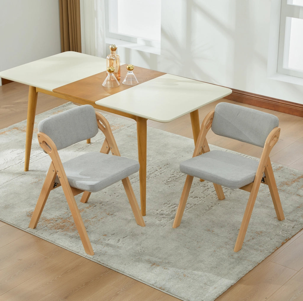 Sedia pieghevole con seduta imbottita in legno grigio