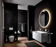 Dispensatore rotondo per sapone liquido nero - manuale a una mano - 500ml di capacità & installazione alla parete facile - accessorio per la stanza da bagno con design moderno