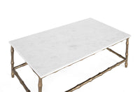 Tavolo centrale con base in metallo e piano in marmo