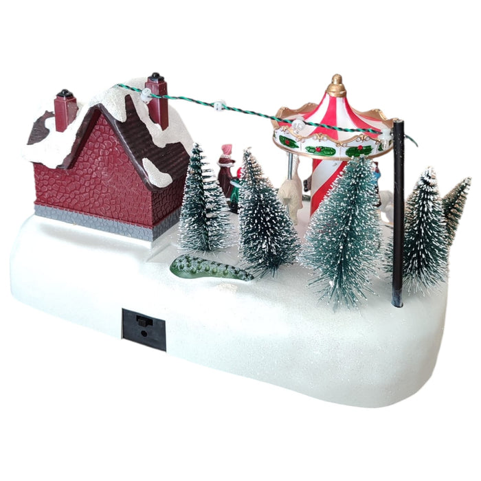 Villaggio Natalizio con Luci Musica Movimento 26cm Parco Giochi o Giostrina