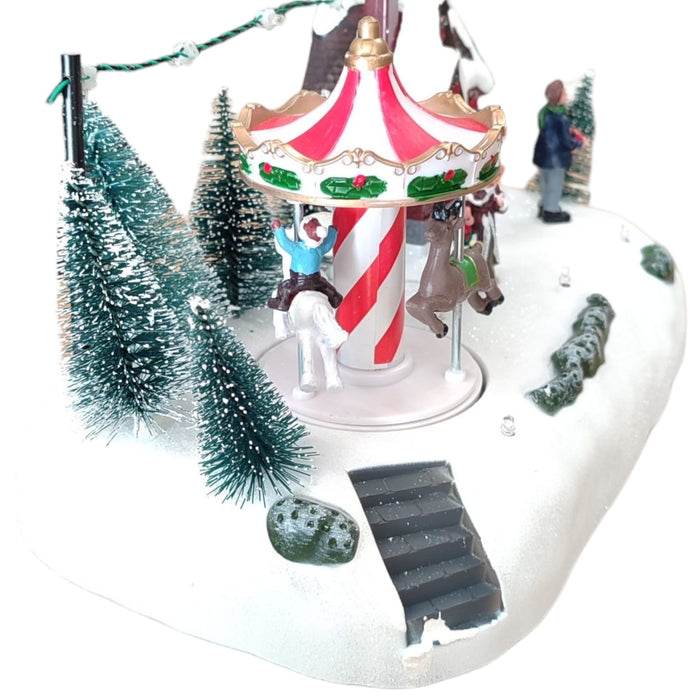 Villaggio Natalizio con Luci Musica Movimento 26cm Parco Giochi o Giostrina