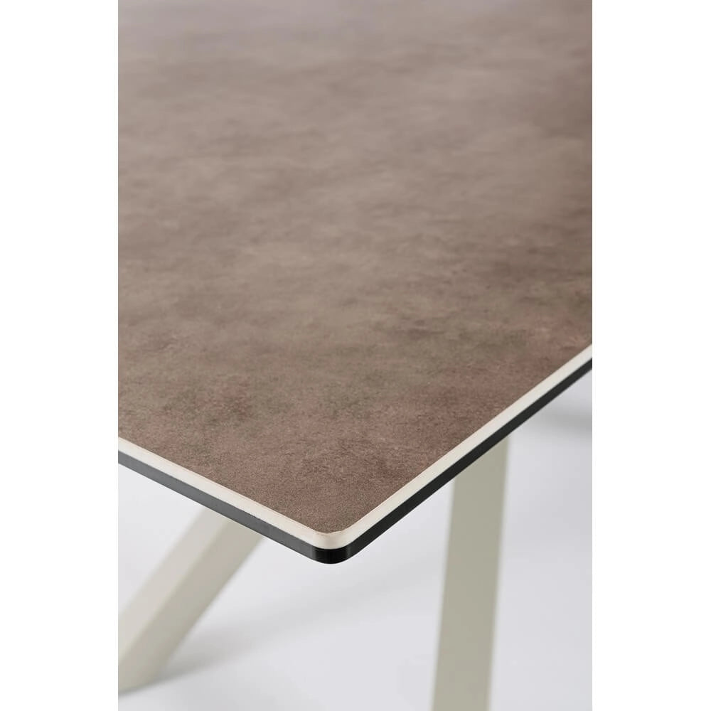 Tavolo da pranzo in ceramica con gambe in acciaio intrecciate - PHOENIX