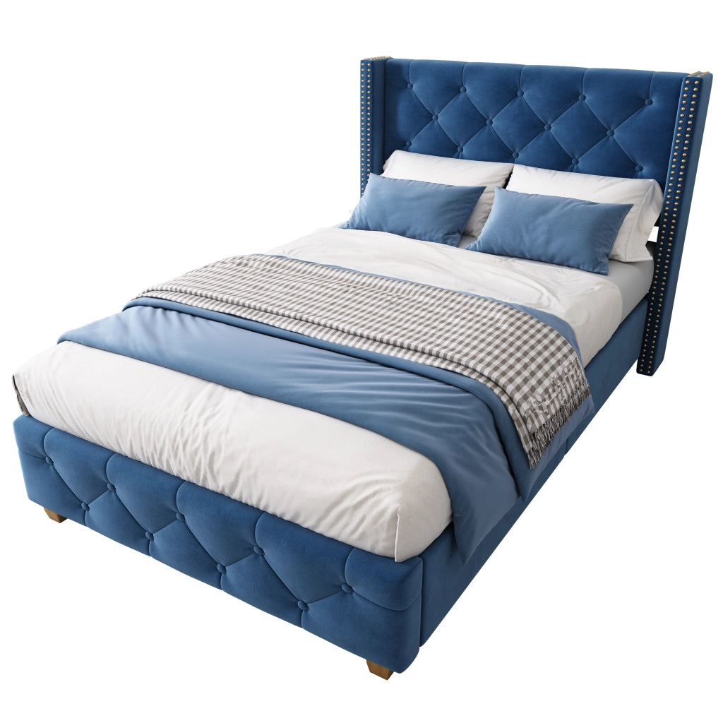 Letto imbottito con testiera capitonné; rivetti decorativi e gambe in legno; velluto blu; 90x200 cm
