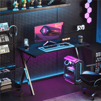 SCRIVANIA GAMING CON LUCI LED RGB REGOLABILI E GAMBE A K IN LEGNO E ACCIAIO 120X60X75 CM NERO