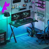 SCRIVANIA GAMING CON LUCI LED RGB REGOLABILI E GAMBE A K IN LEGNO E ACCIAIO 120X60X75 CM NERO