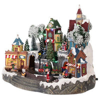 Villaggio natalizio con treno in movimento, negozi, luci e musica (4