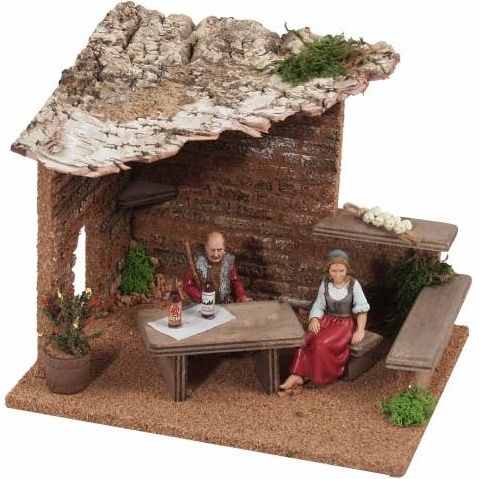 Cantina con contadini che pranzano per presepe
