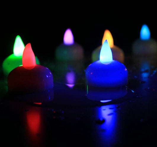 CANDELE GALLEGGIANTI LED RGB A BATTERIA ACQUA SENSORE 12 PZ. SENZA FIAMMA MATRIMONIO COMPLEANNO SAN VALENTINO