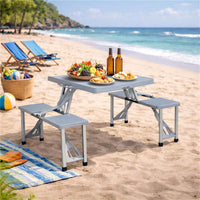 SET TAVOLO PIEGHEVOLE CON 4 SGABELLI IN COLORE GRIGIO