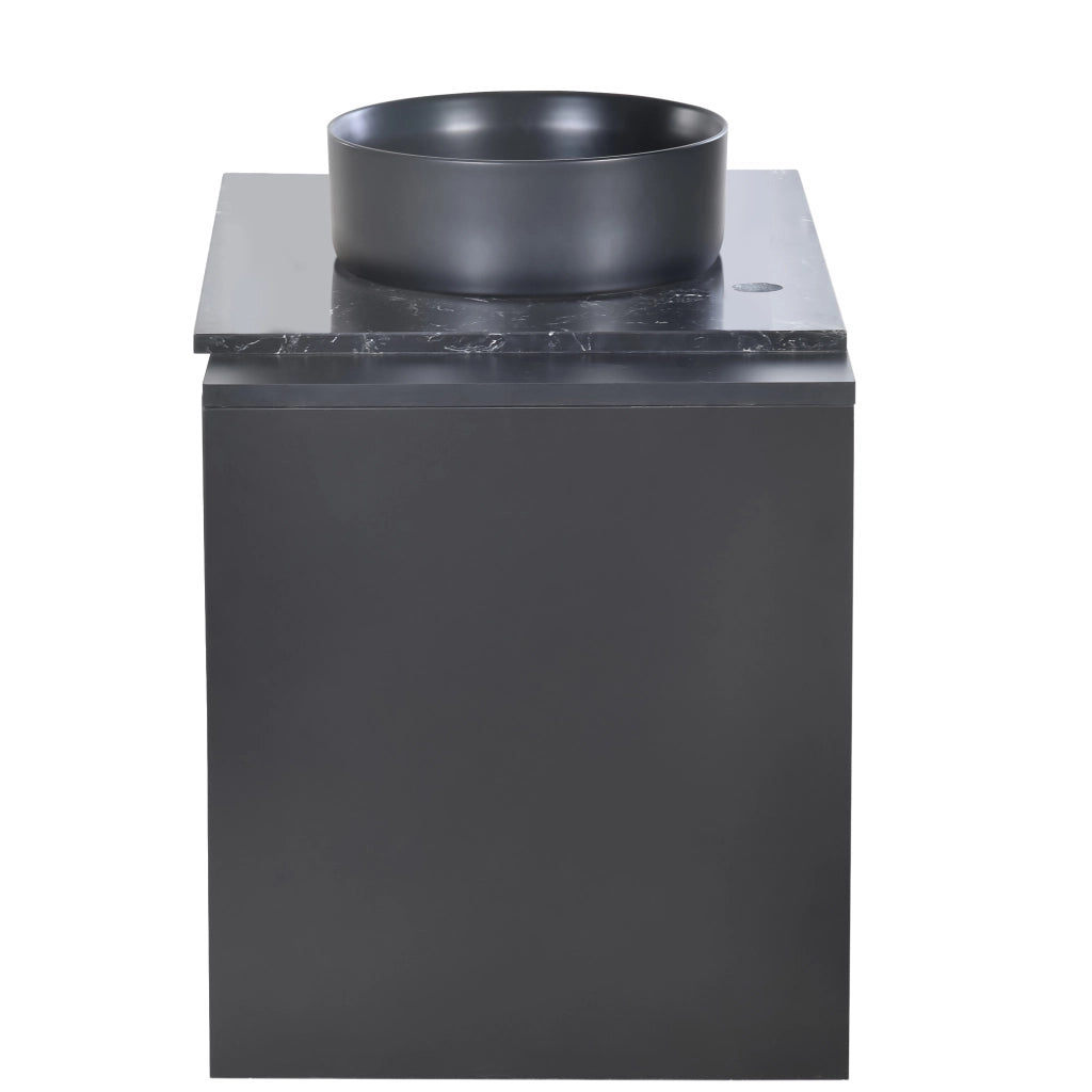 Mobile bagno con lavabo rotondo in ceramica e piano in marmo; nero e grigio