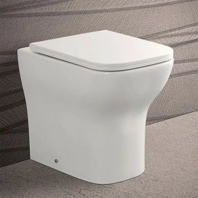 Wc filomuro bianco lucido senza brida con scarico multiplo  Plana