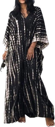Abbigliamento lungo per donne - Tunicca da spiaggia con collo V e divisione laterale - Abbigliamento da salotto con stoffa a fiori