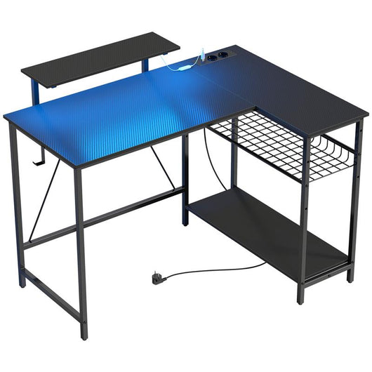 SCRIVANIA GAMING ANGOLARE CON LED, PRESE ELETTRICHE, SUPPORTO PER MONITOR E SCAFFALE, NERO