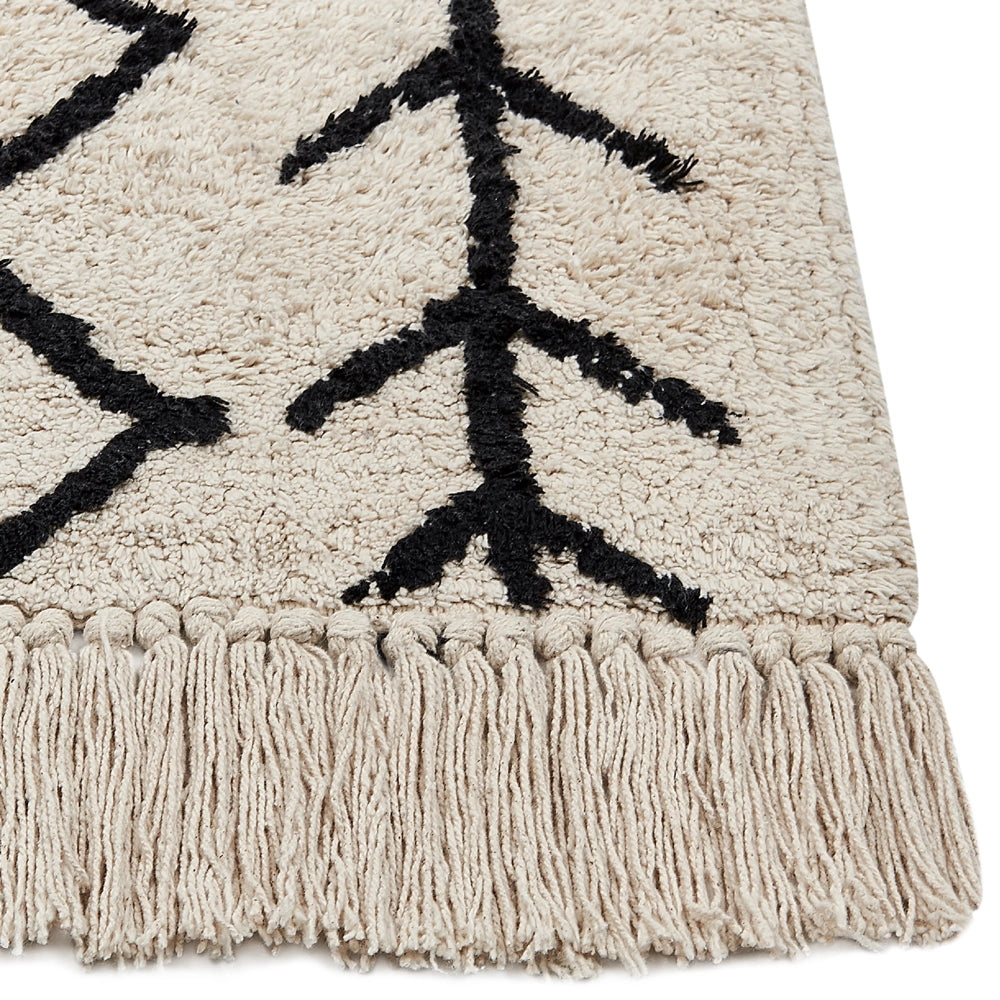 Tappeto in cotone beige e nero con motivo geometrico e nappe 160 x 230 cm camera da letto soggiorno