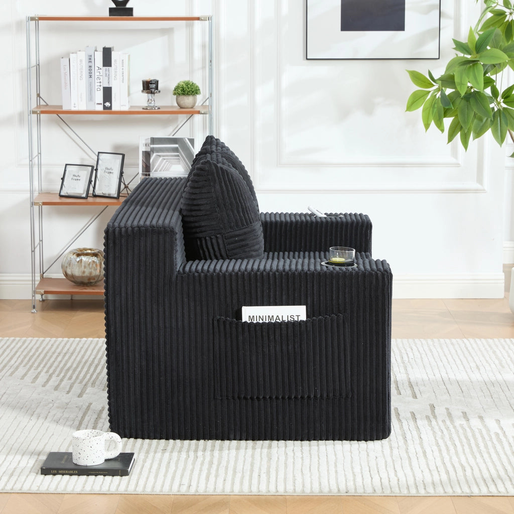 Divano pouf 151x133x64 cm con tasche laterali in velluto a coste nero