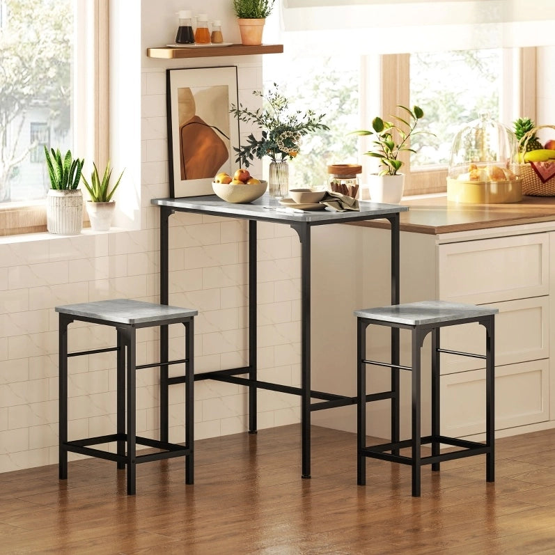 Set tavolo bar 80x50x87 cm con 2 sgabelli; struttura stabile in acciaio grigio