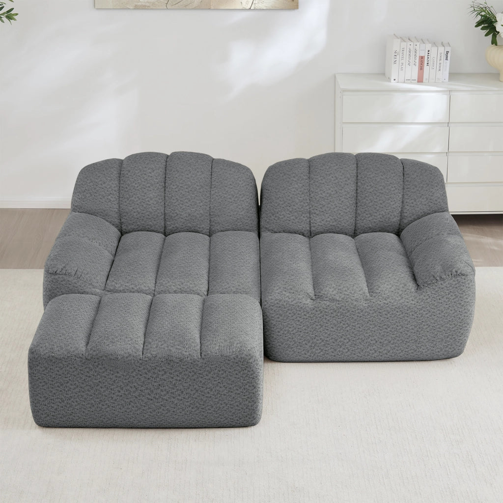 Divano angolare modulare senza struttura con pouf e seduta ampia in pile granulato grigio 210 × 165 × 79 cm