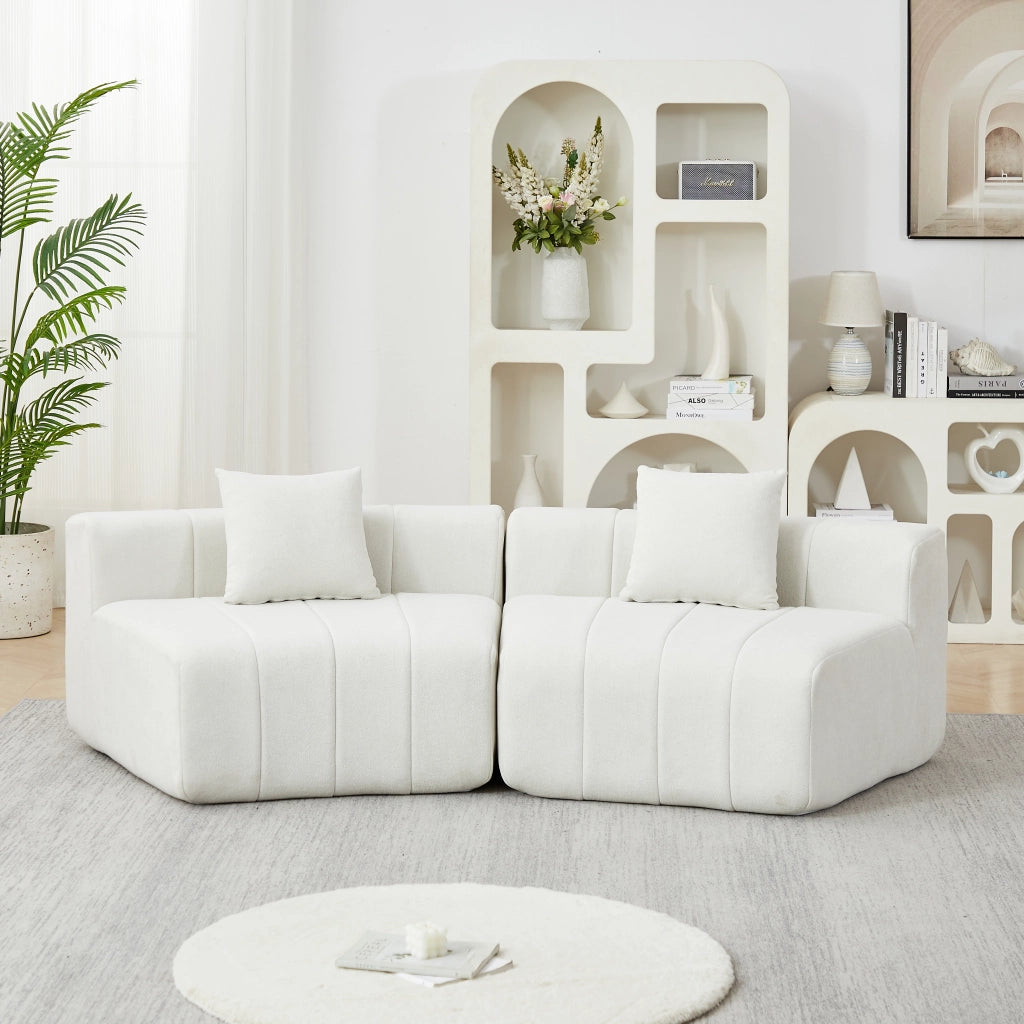 DIVANO Modulare curvo in chenille beige con 2 cuscini