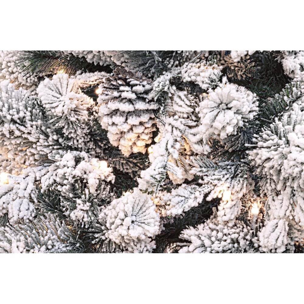 Albero di Natale Arves innevato H180 con 1383 rami e 230 luci