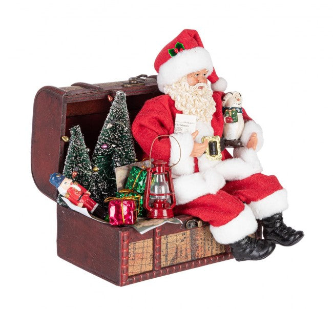 Babbo Natale Denzel seduto rosso con panchina