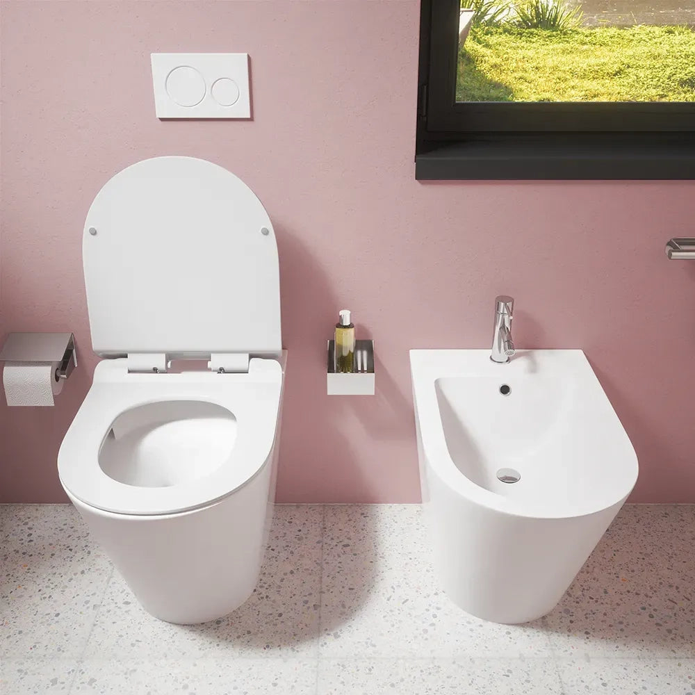 Sanitari filomuro in ceramica bianco lucido vaso tornado silent flush sedile soft-close e bidet | Rio