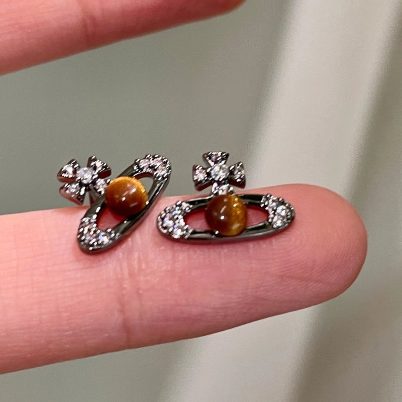 Orecchini a spillo in argento S925 dallo stile dolce e raffinato; orecchini a lobo con occhio di tigre in cristallo nero.