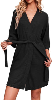 Badia da bagno da sauna per donne con maniche corte 3/4, con cinturino e V-collo nero.