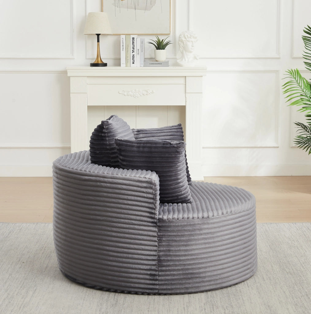 Poltrona lounge rotonda 110 cm grigia in velluto a coste con 3 cuscini