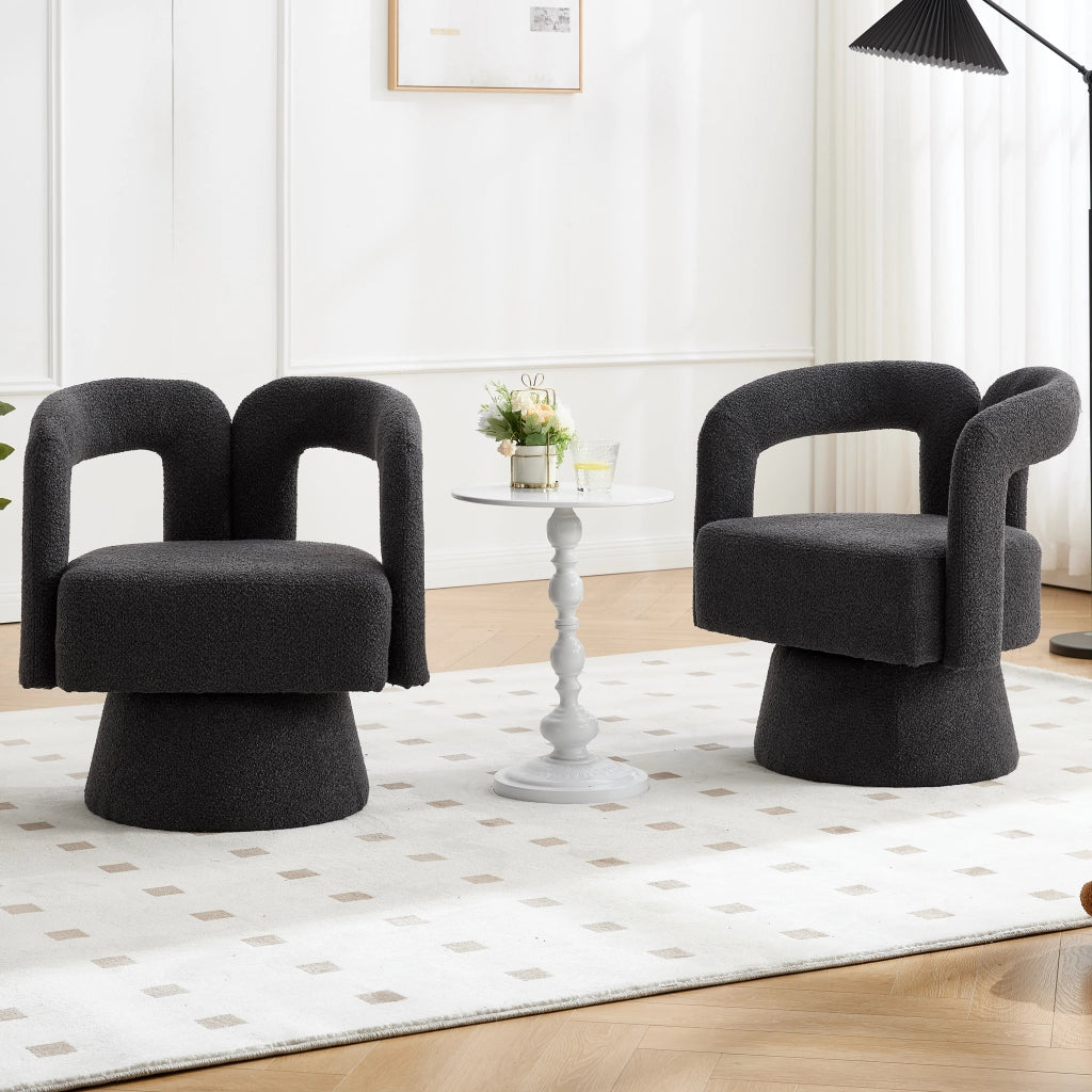 Poltrona girevole 360° in bouclé grigio scuro, con braccioli arrotondati e base in metallo