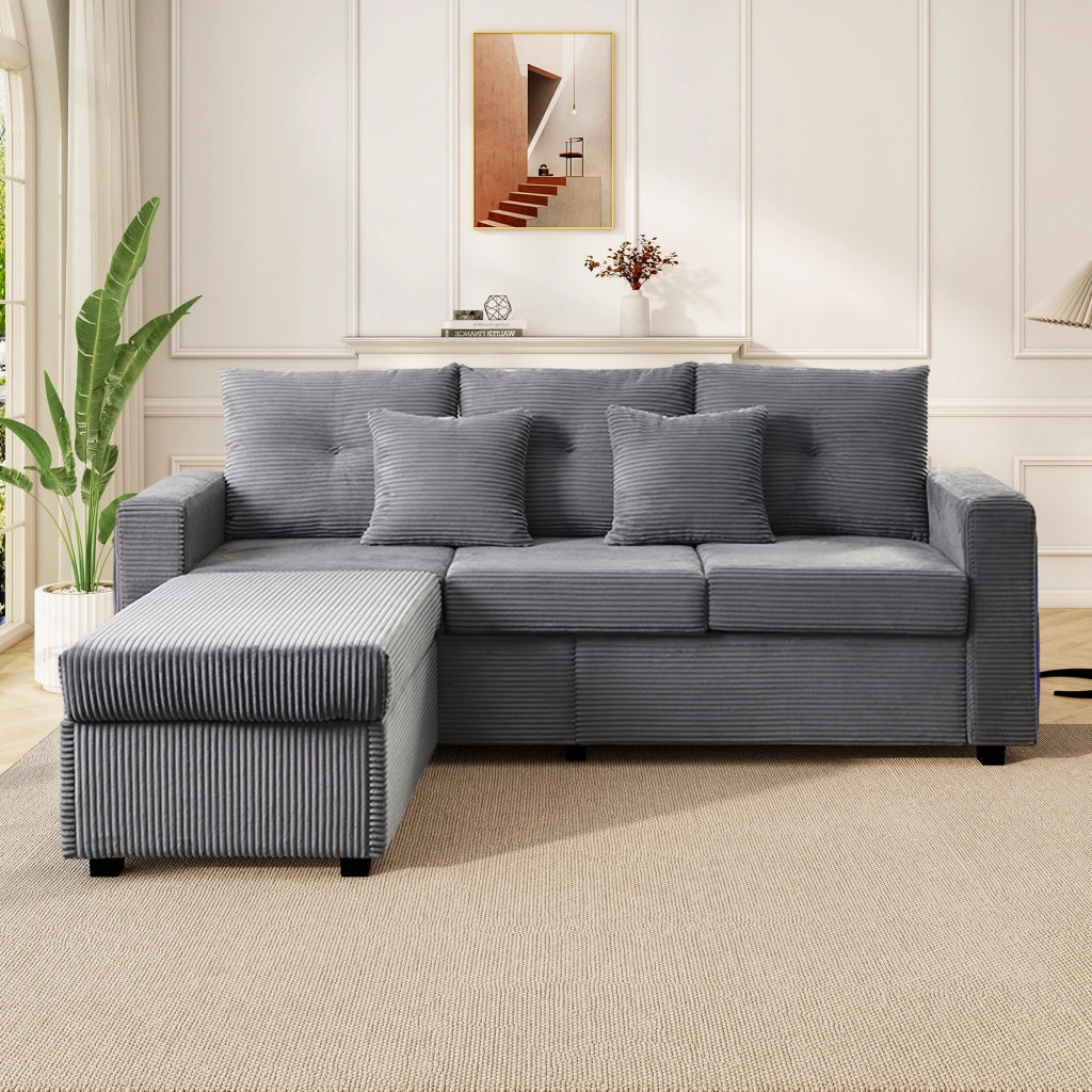 Divano modulare a L con pouf e luci LED; con tasche laterali; in tessuto a coste grigio antico
