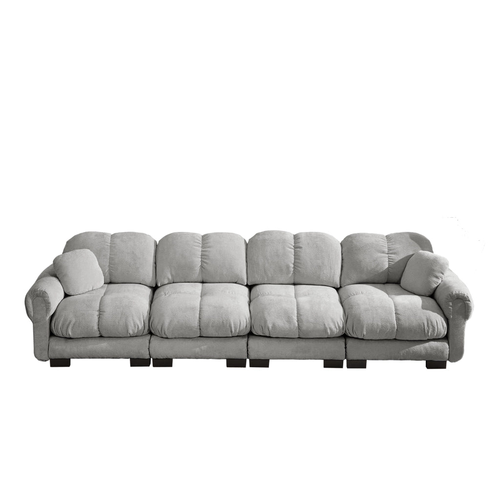 Divano modulare 4 posti con cuciture trapuntate e cuscino lombare in chenille grigio chiaro