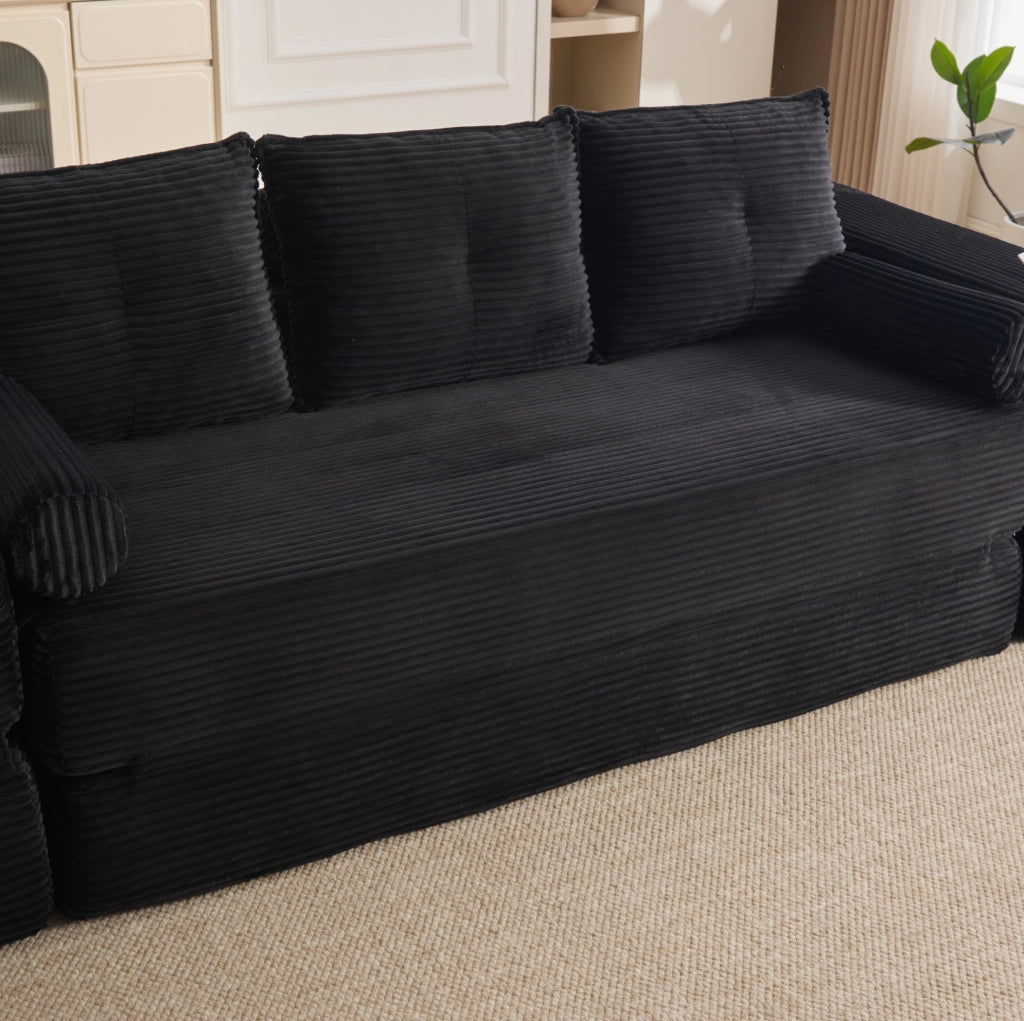 Divano letto ULEVR 232x98 cm in velluto a coste nero con portabevande, tasche laterali e cuscini memory