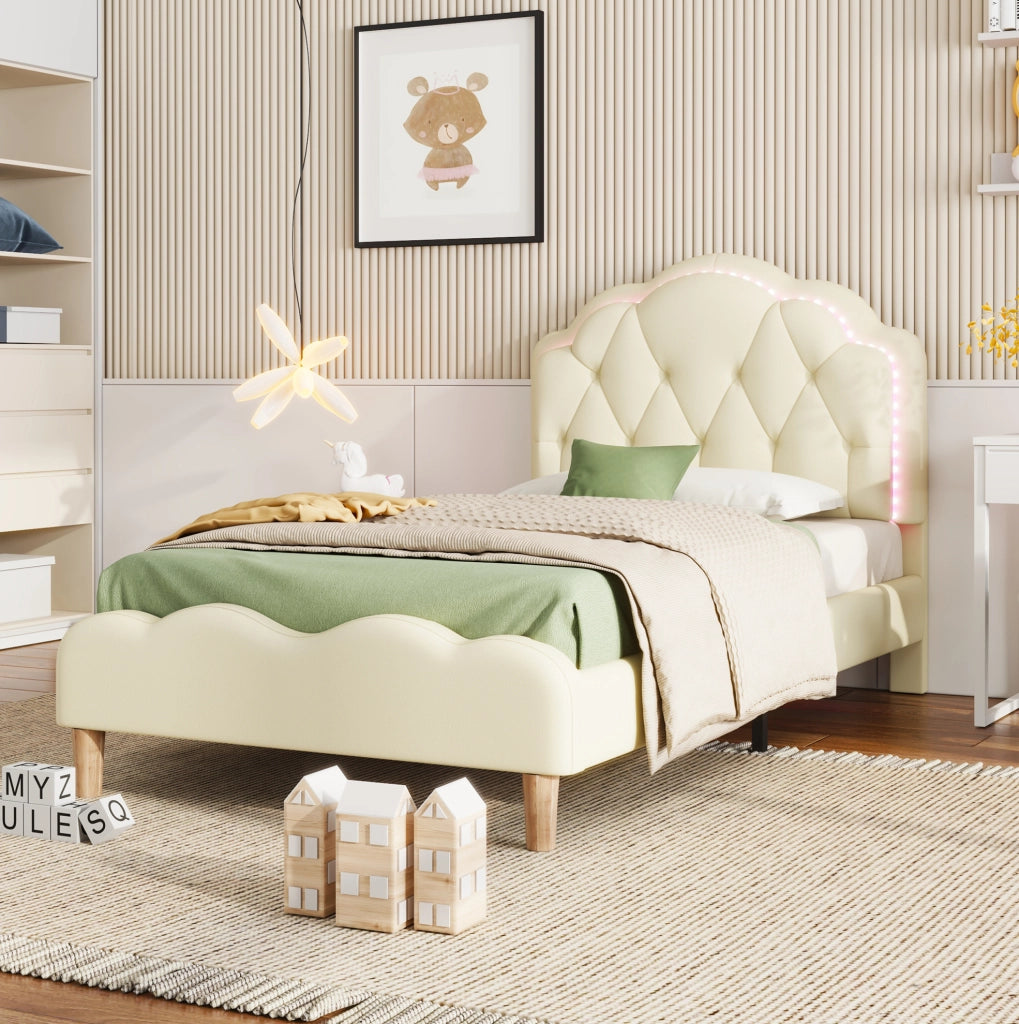 Letto imbottito in PU beige con testiera ondulata e strisce luminose multicolore